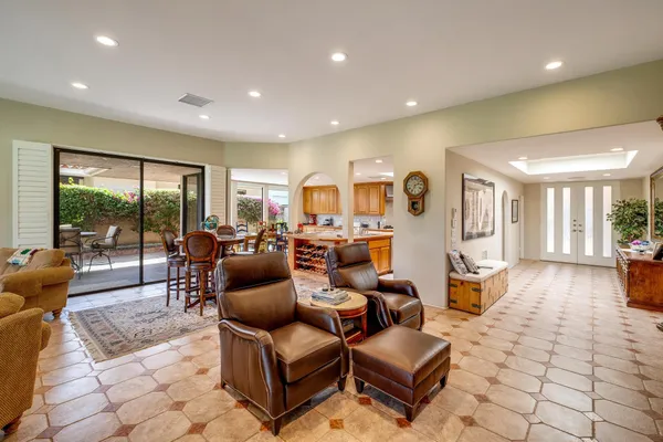 a living room with furniture and a table