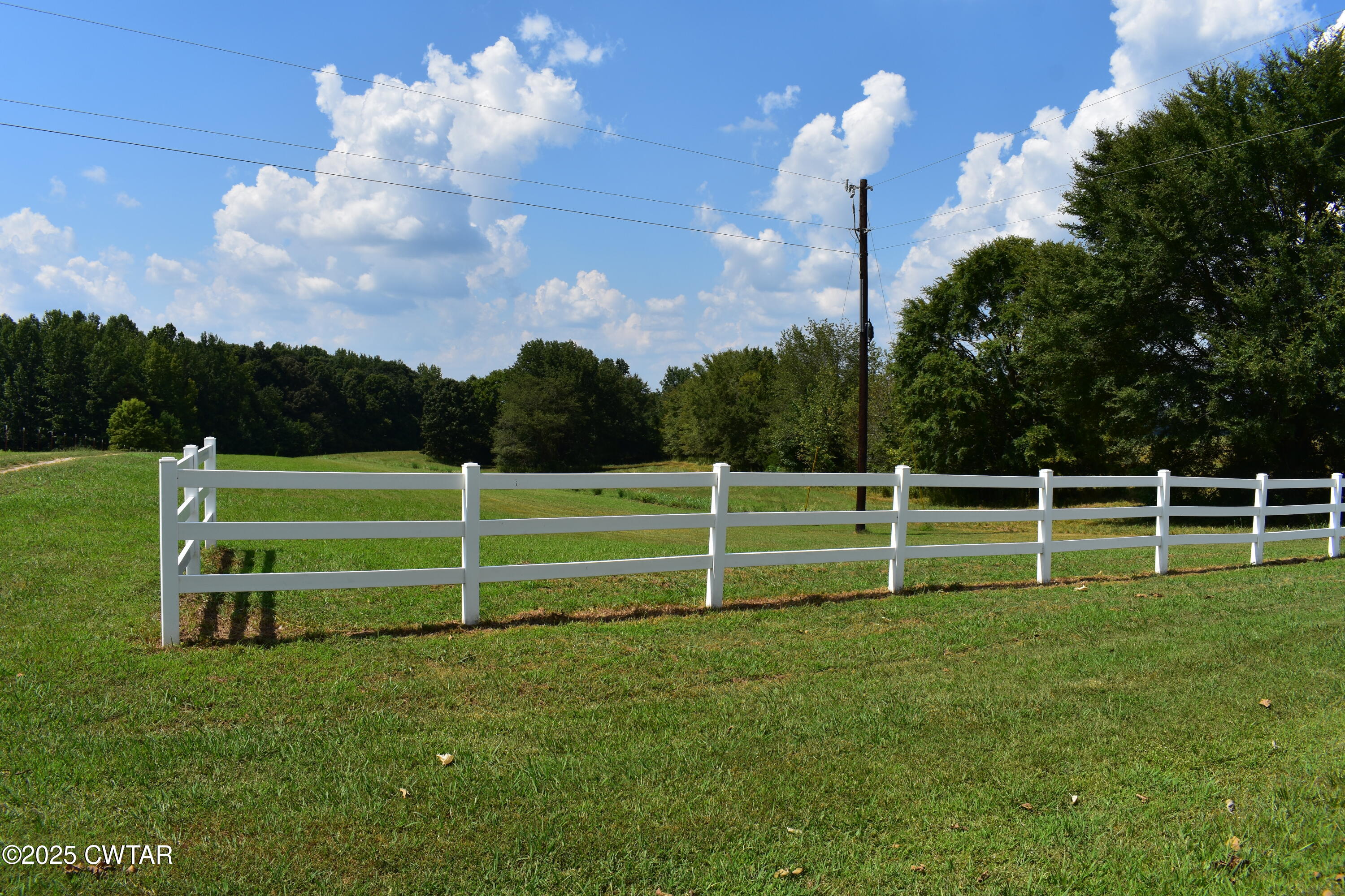 715 Roundtree Lane Beech Bluff, TN 38313 - Photo 2 of 24 a view of a golf course with a garden