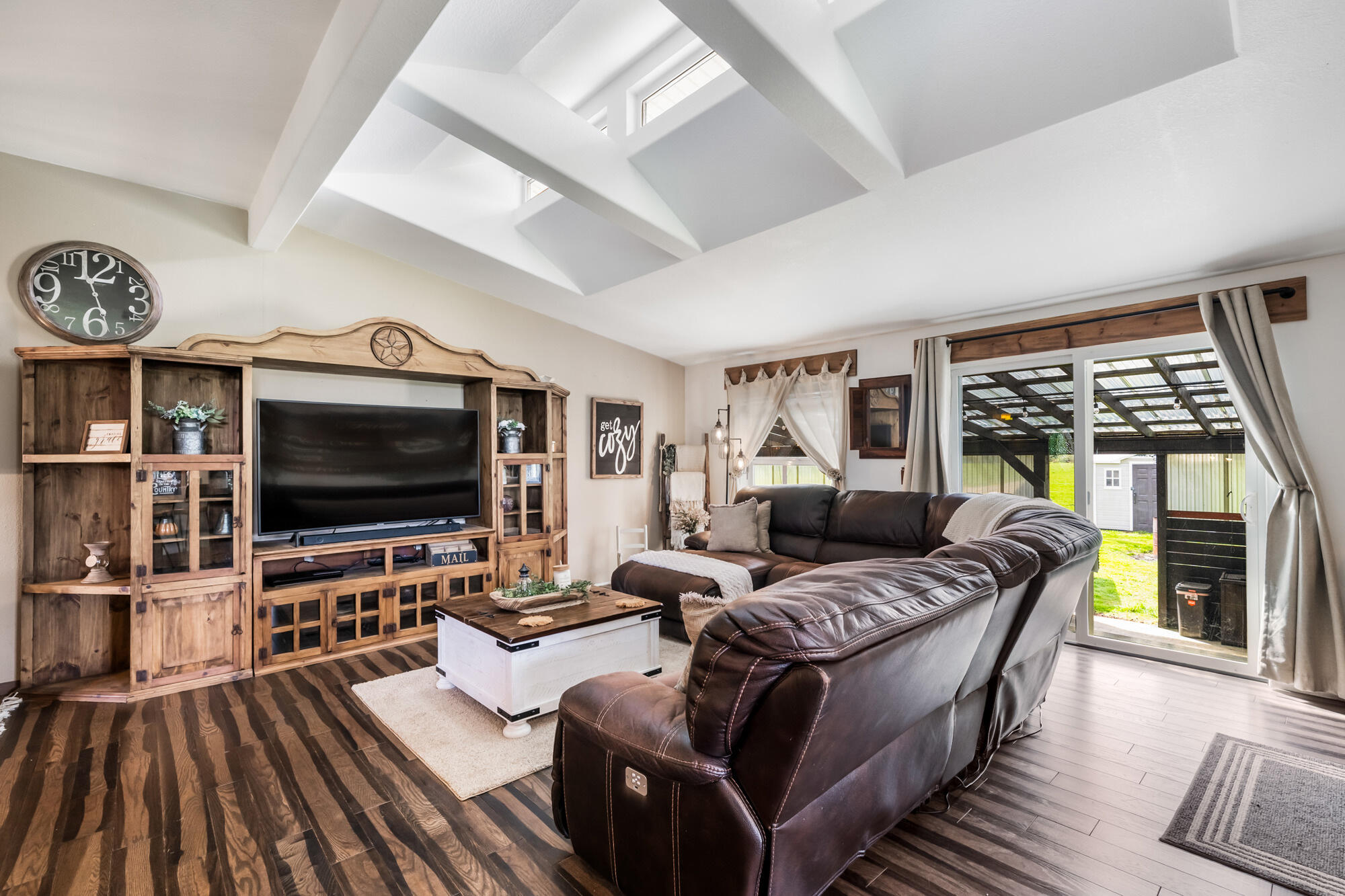 7400 South Prairie Road Tillamook, OR 97141 - Photo 17 of 62 a living room with furniture and a flat screen tv