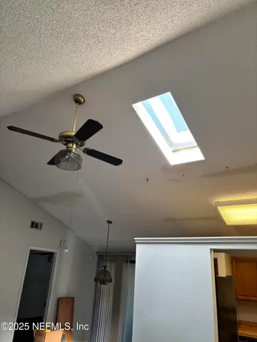 a view of a hallway with workspace