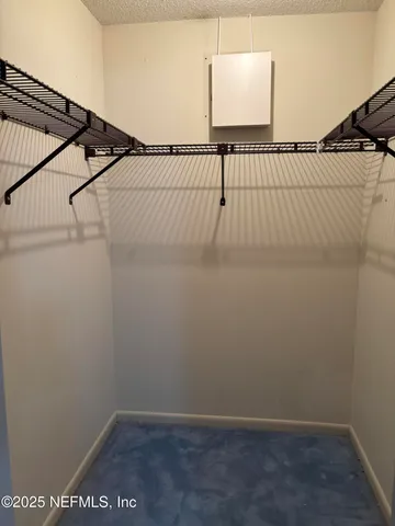 a bathroom with a shower toilet and sink