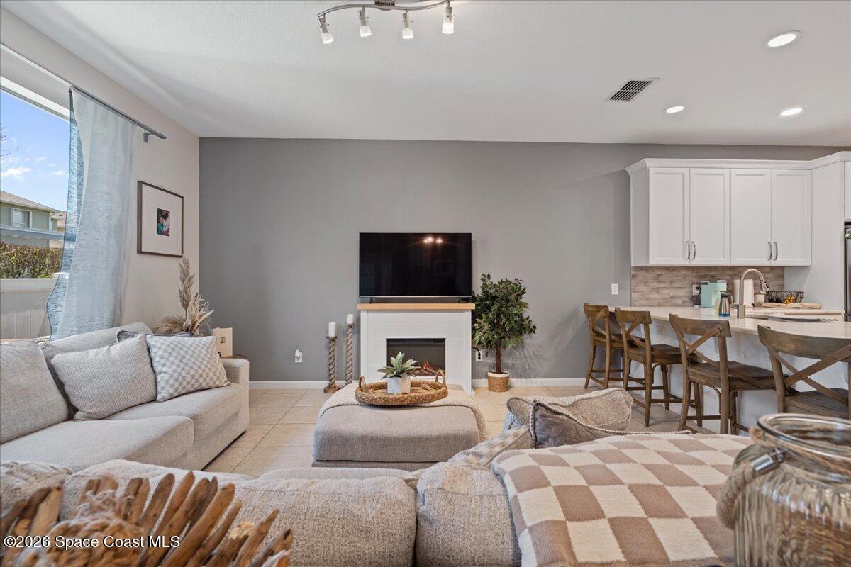 3271 Titanic Circle, Unit 39 Melbourne, FL 32903 - Photo 16 of 47 Family Room off Kitchen