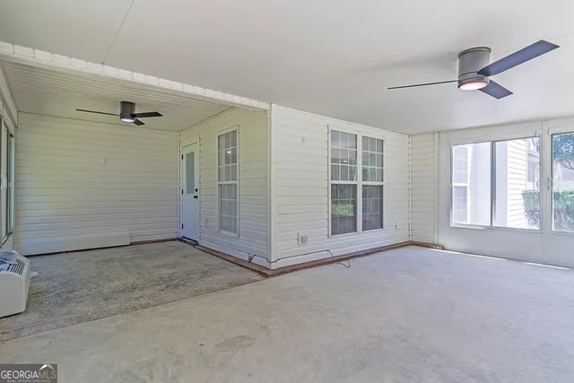 an empty room with windows