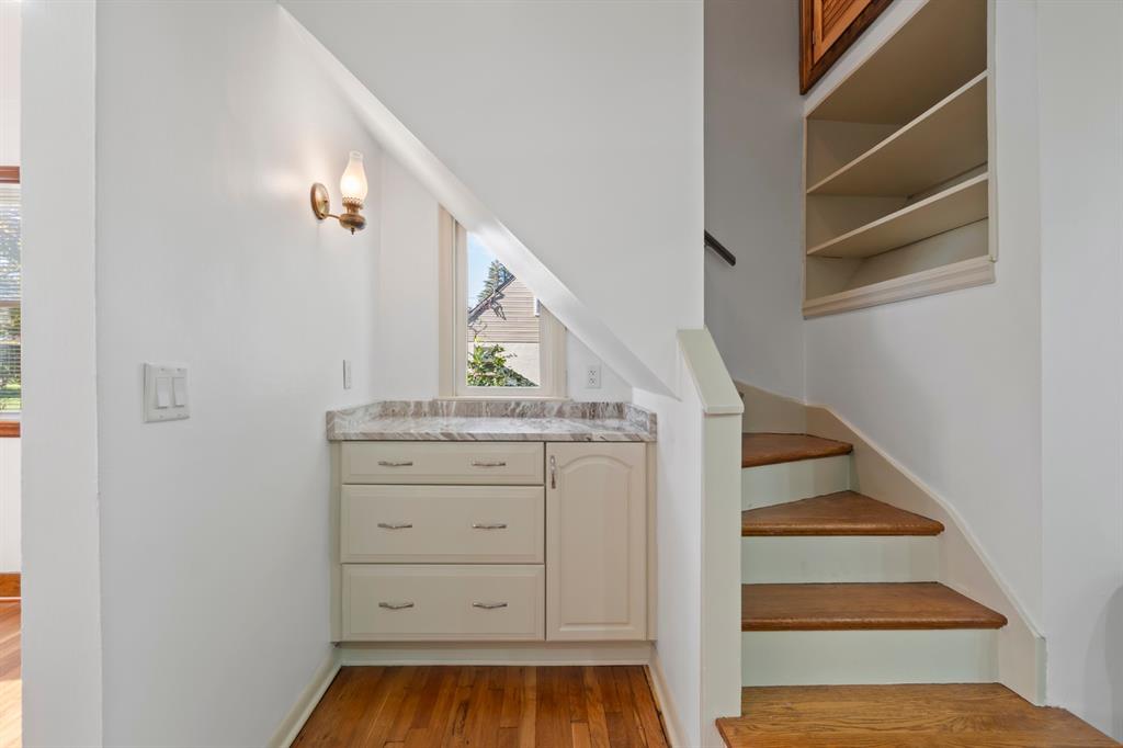 339 Center Road Monroeville, PA 15146 - Photo 11 of 43 Coffee Nook! Staircase leading to the 2nd floor and Built in Shelves with storage above.