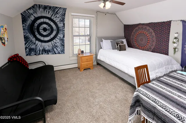 a view of houses with truck parked