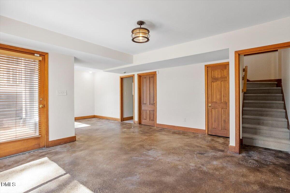 4805 Rembert Drive Raleigh, NC 27612 - Photo 30 of 45 a view of an empty room with a window
