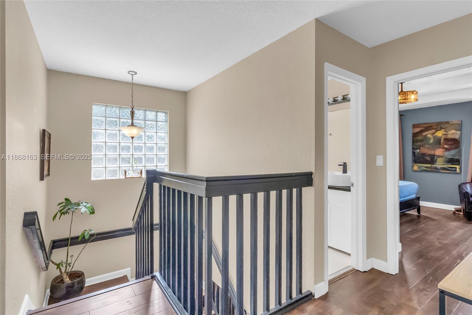 12160 Southwest 135th Terrace Miami, FL 33186 - Photo 15 of 46 a view of hallway with furniture and a window
