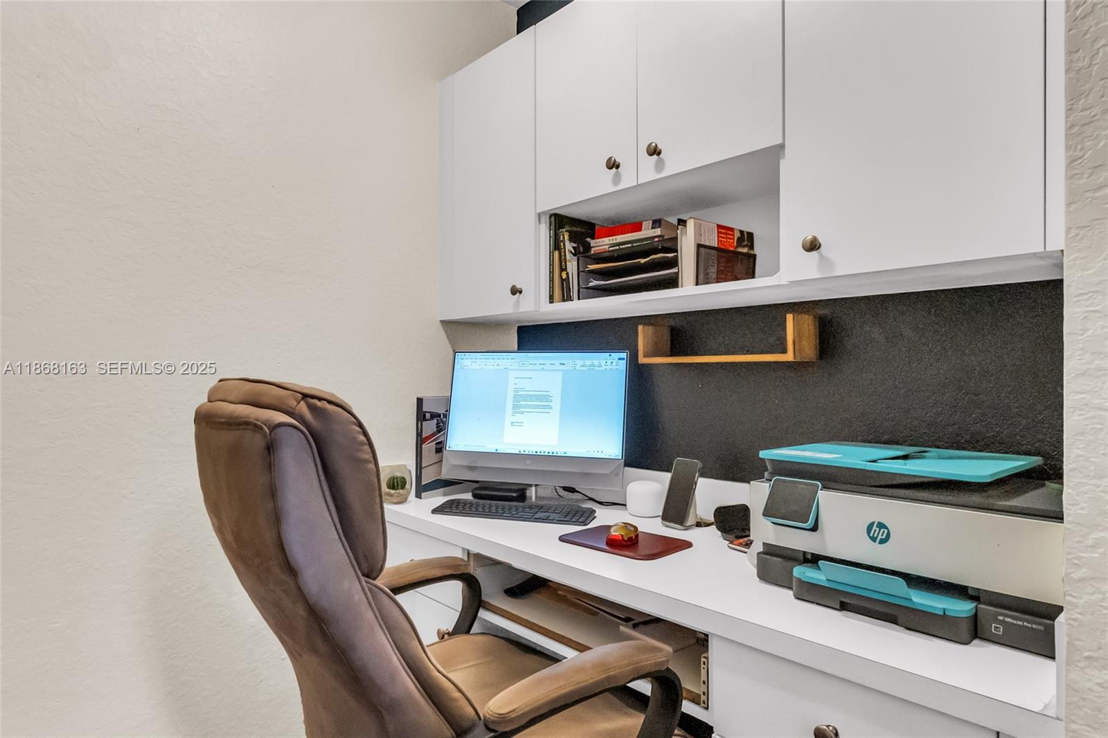 12160 Southwest 135th Terrace Miami, FL 33186 - Photo 16 of 46 a workspace with furniture and window