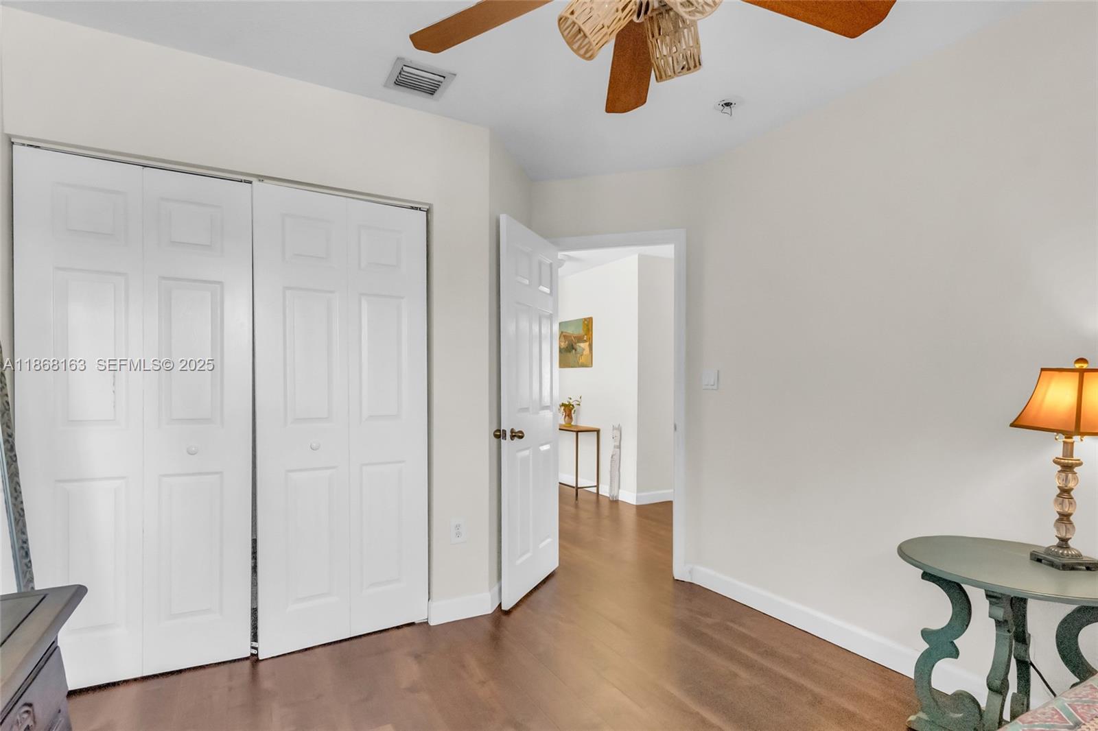12160 Southwest 135th Terrace Miami, FL 33186 - Photo 23 of 46 a view of a room with wooden floor table and chairs