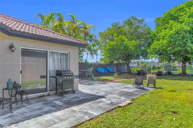 a view of a backyard with a slide