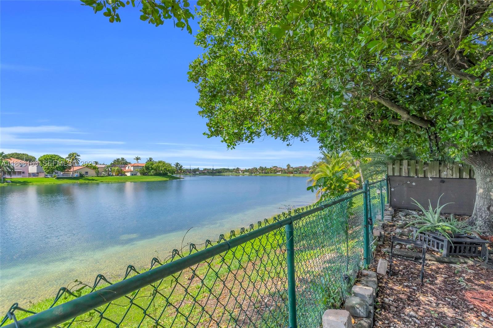 12160 Southwest 135th Terrace Miami, FL 33186 - Photo 31 of 46 a view of a lake from a balcony
