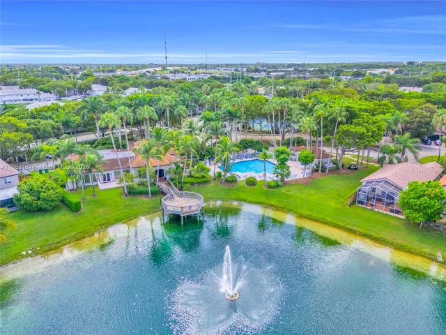 a view of a garden with houses