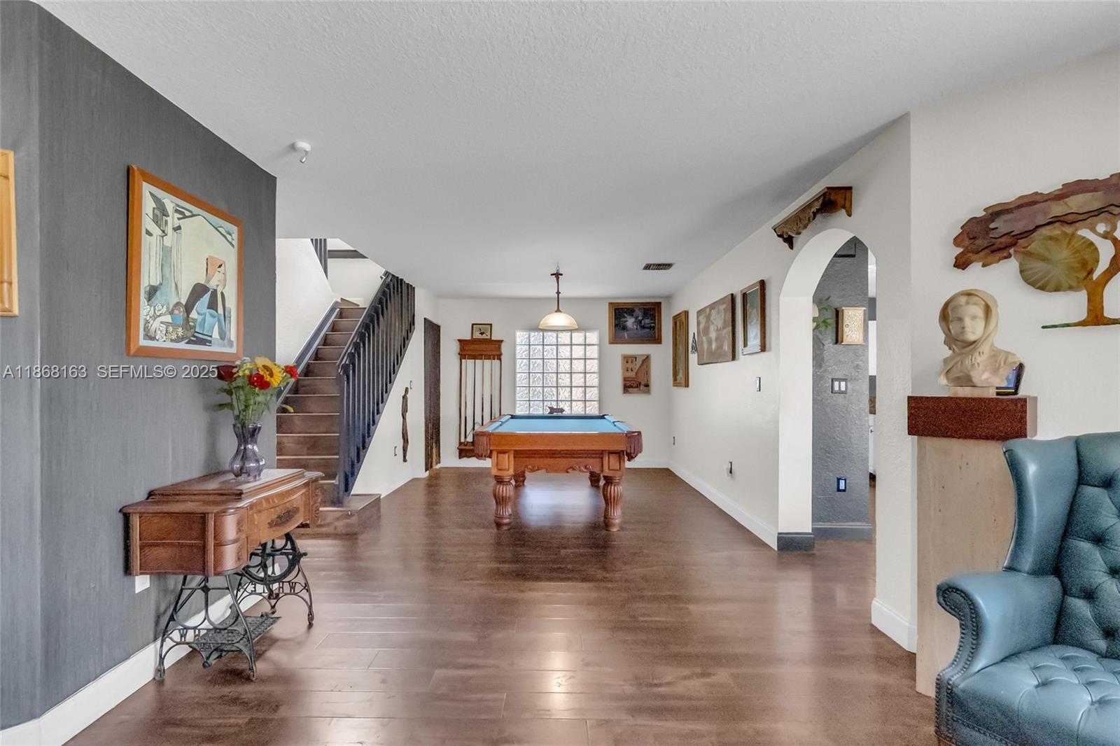 12160 Southwest 135th Terrace Miami, FL 33186 - Photo 4 of 46 a view of a livingroom with furniture and a flat screen tv