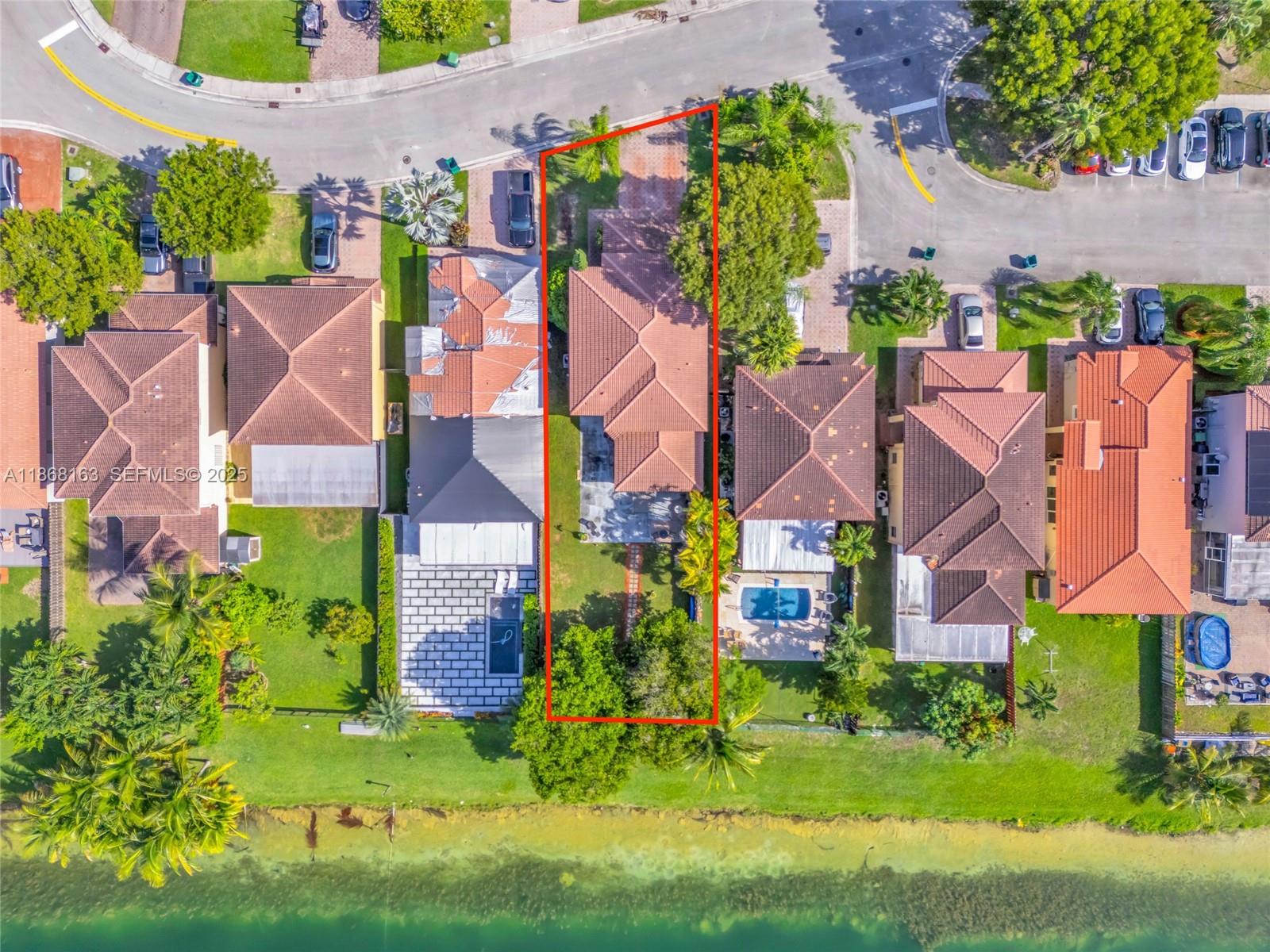 12160 Southwest 135th Terrace Miami, FL 33186 - Photo 46 of 46 an aerial view of multiple houses with yard