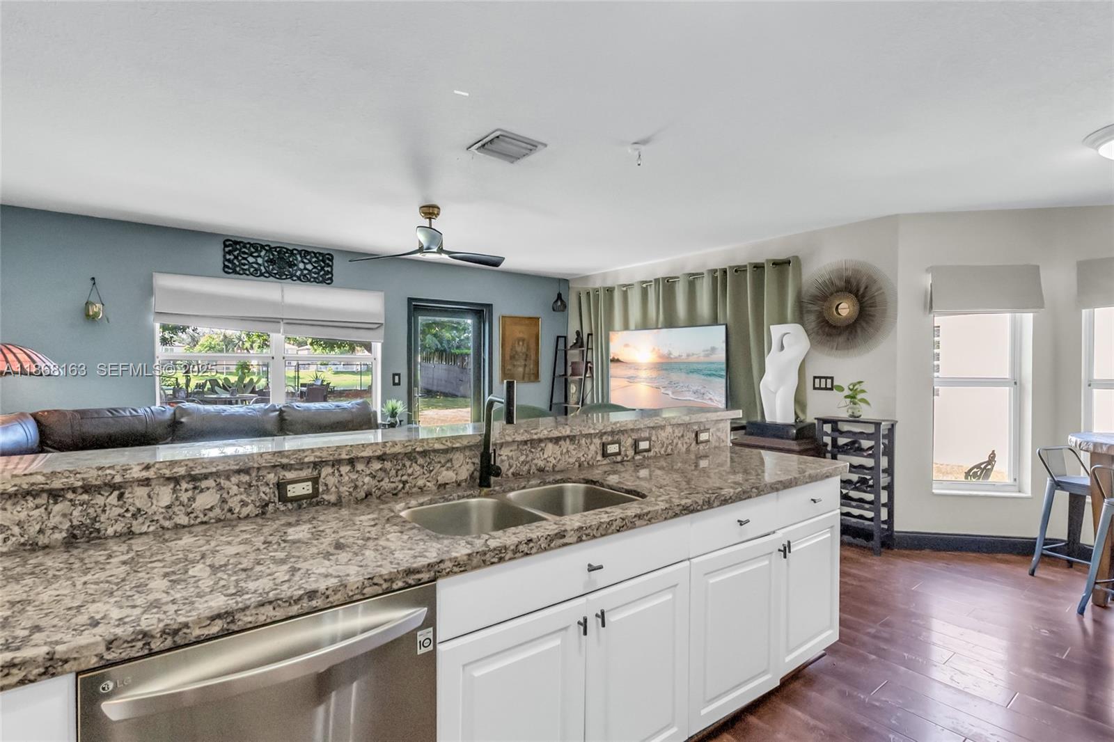 12160 Southwest 135th Terrace Miami, FL 33186 - Photo 10 of 46 a kitchen with counter top space and windows