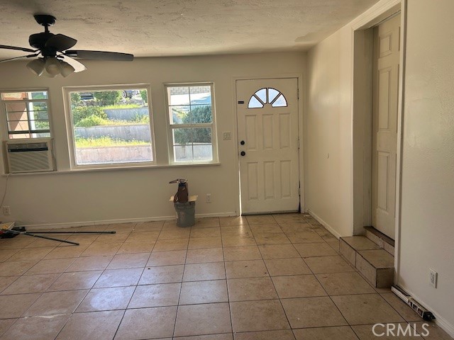 3483 Skylane Drive Riverside, CA 92509 - Photo 2 of 15 a view of an empty room with a window