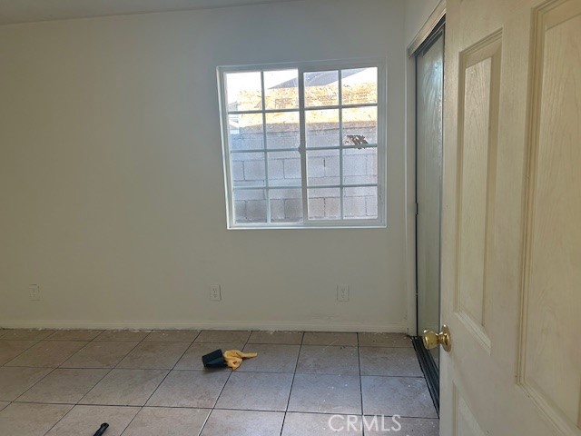 3483 Skylane Drive Riverside, CA 92509 - Photo 6 of 15 an empty room with a window