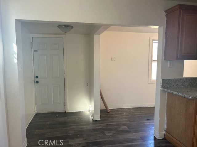 3483 Skylane Drive Riverside, CA 92509 - Photo 7 of 15 a view of empty room with wooden floor and fan