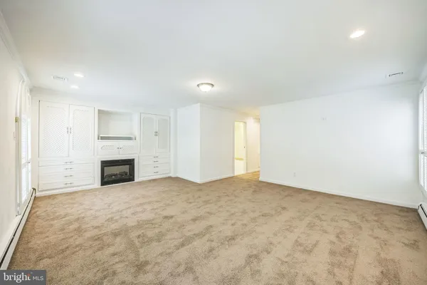 a bathroom with a bathtub and a sink