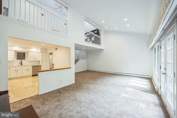 a view of a kitchen with furniture and a kitchen