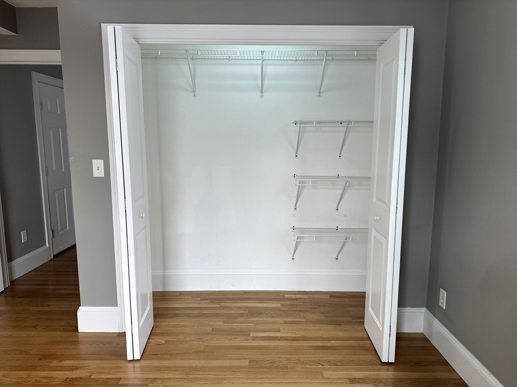 8 Common Street, Unit 3 Stoneham, MA 02180 - Photo 13 of 29 a view of an empty walk in closet