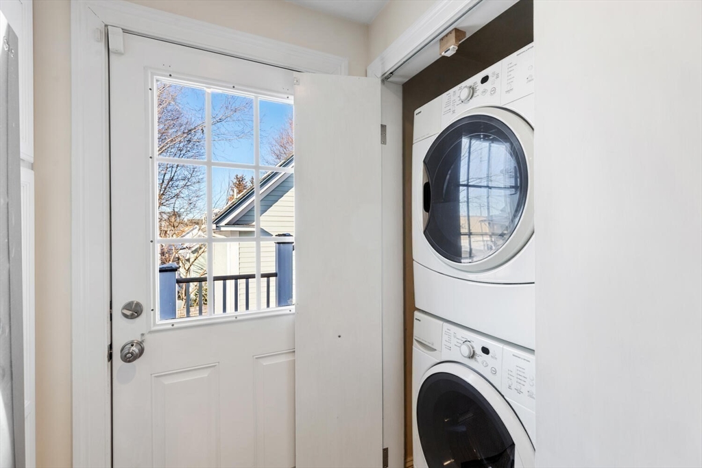 8 Common Street, Unit 3 Stoneham, MA 02180 - Photo 19 of 29 a utility room with dryer and washer