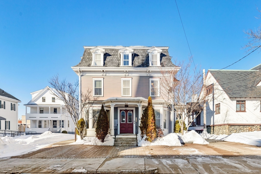 8 Common Street, Unit 3 Stoneham, MA 02180 - Photo 22 of 29 a view of a building with a street