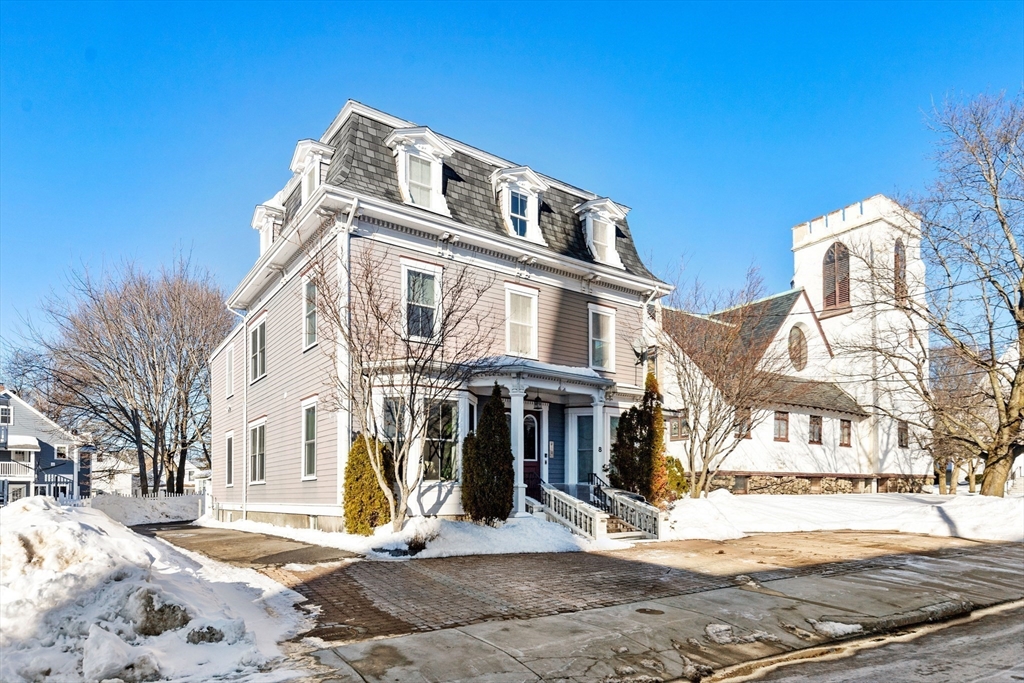 8 Common Street, Unit 3 Stoneham, MA 02180 - Photo 23 of 29 a front view of a building