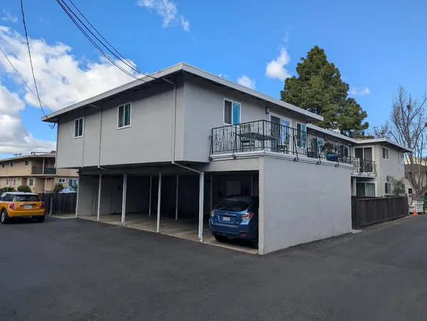 a house view with a garden space