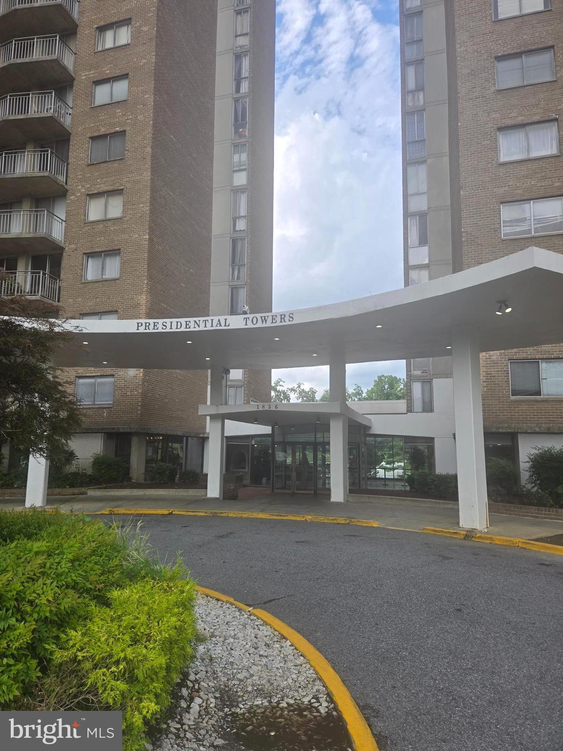 1836 Metzerott Road, Unit 1606 Hyattsville, MD 20783 - Photo 1 of 18 a front view of a building with glass windows and door