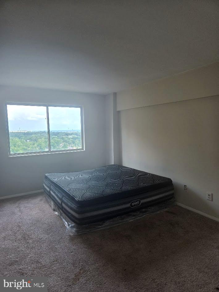 1836 Metzerott Road, Unit 1606 Hyattsville, MD 20783 - Photo 13 of 18 a room with a bed and a window