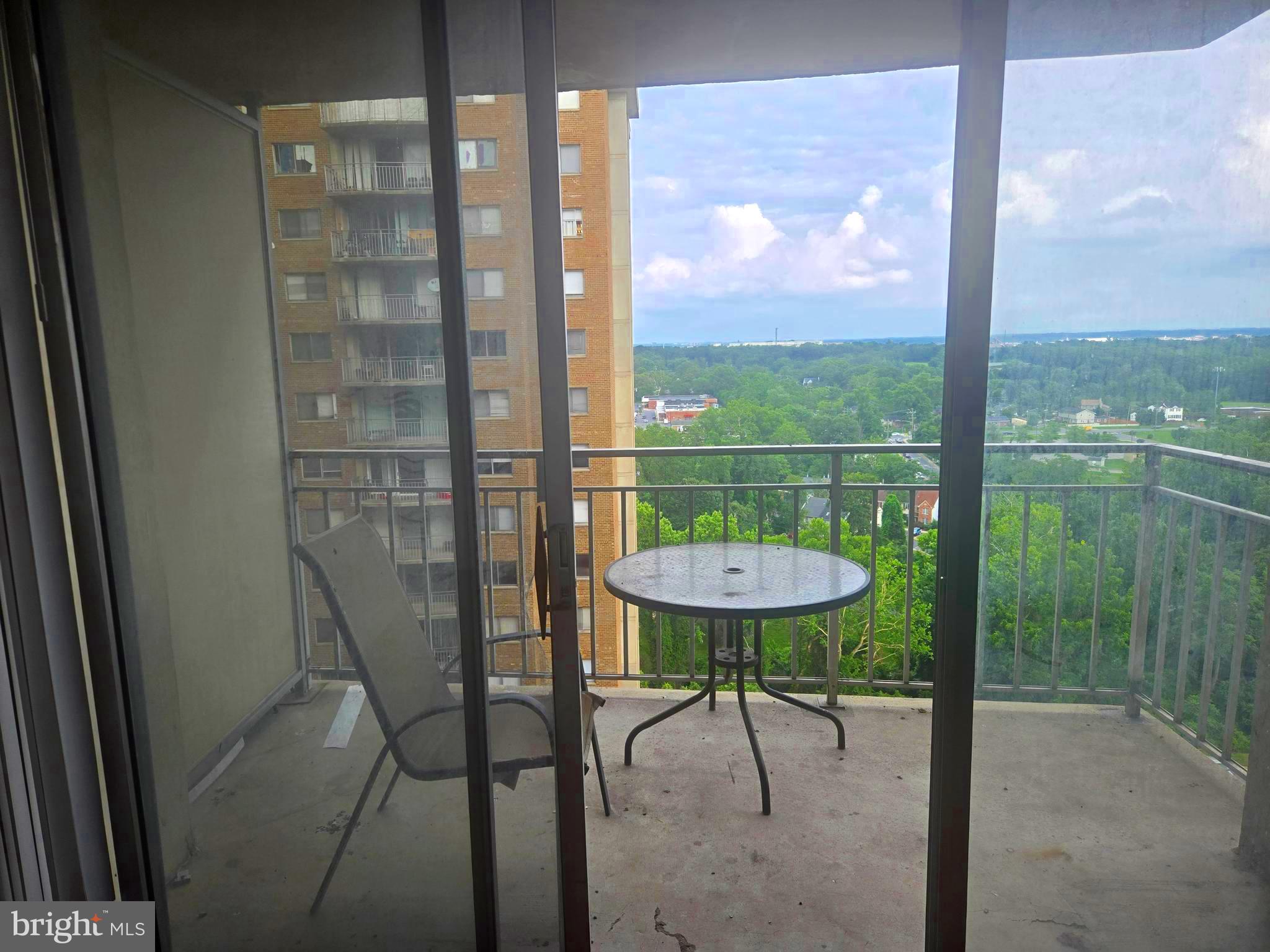 1836 Metzerott Road, Unit 1606 Hyattsville, MD 20783 - Photo 8 of 18 a view of a chairs and table in patio