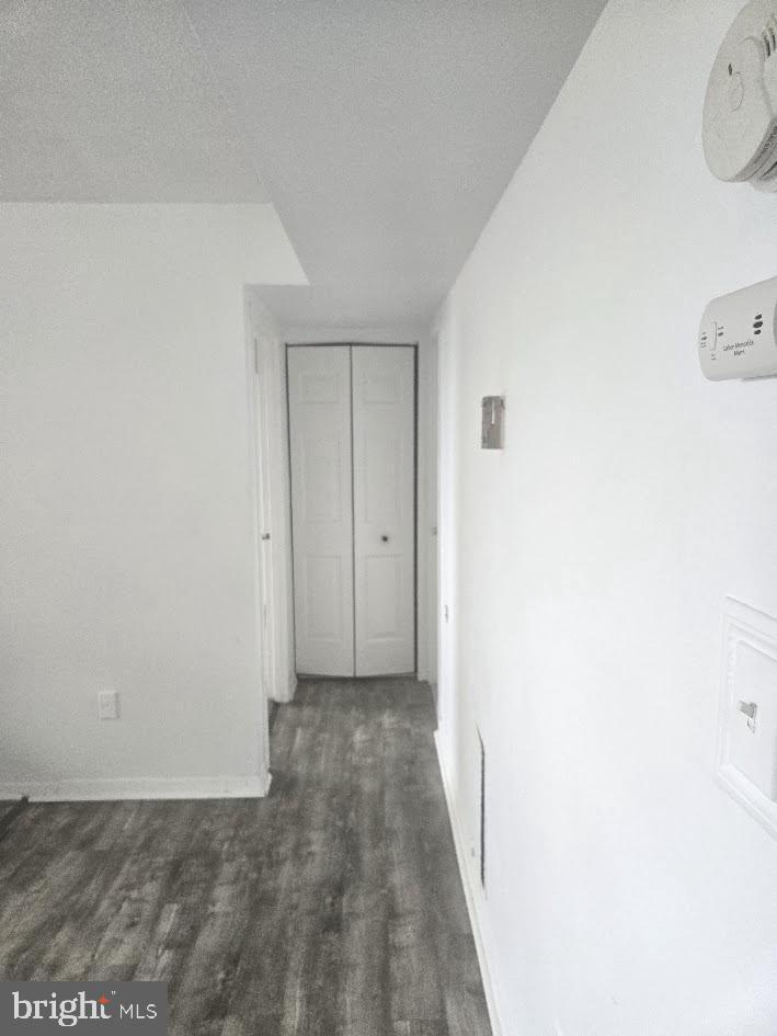 1836 Metzerott Road, Unit 1606 Hyattsville, MD 20783 - Photo 10 of 18 a view of hallway with white wall