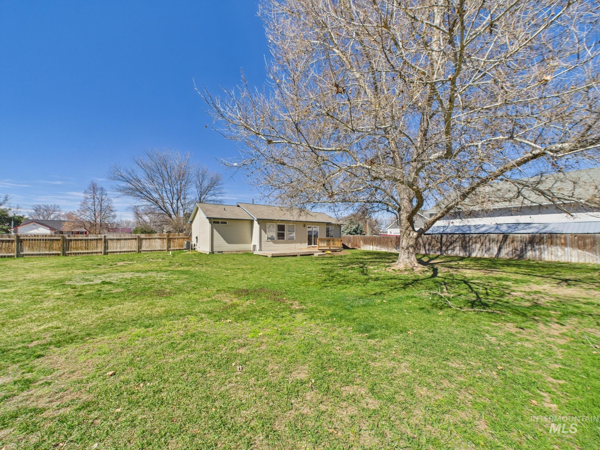 1786 North Plaza Road Emmett, ID 83617 - Photo 27 of 36 Fenced backyard with a patio area