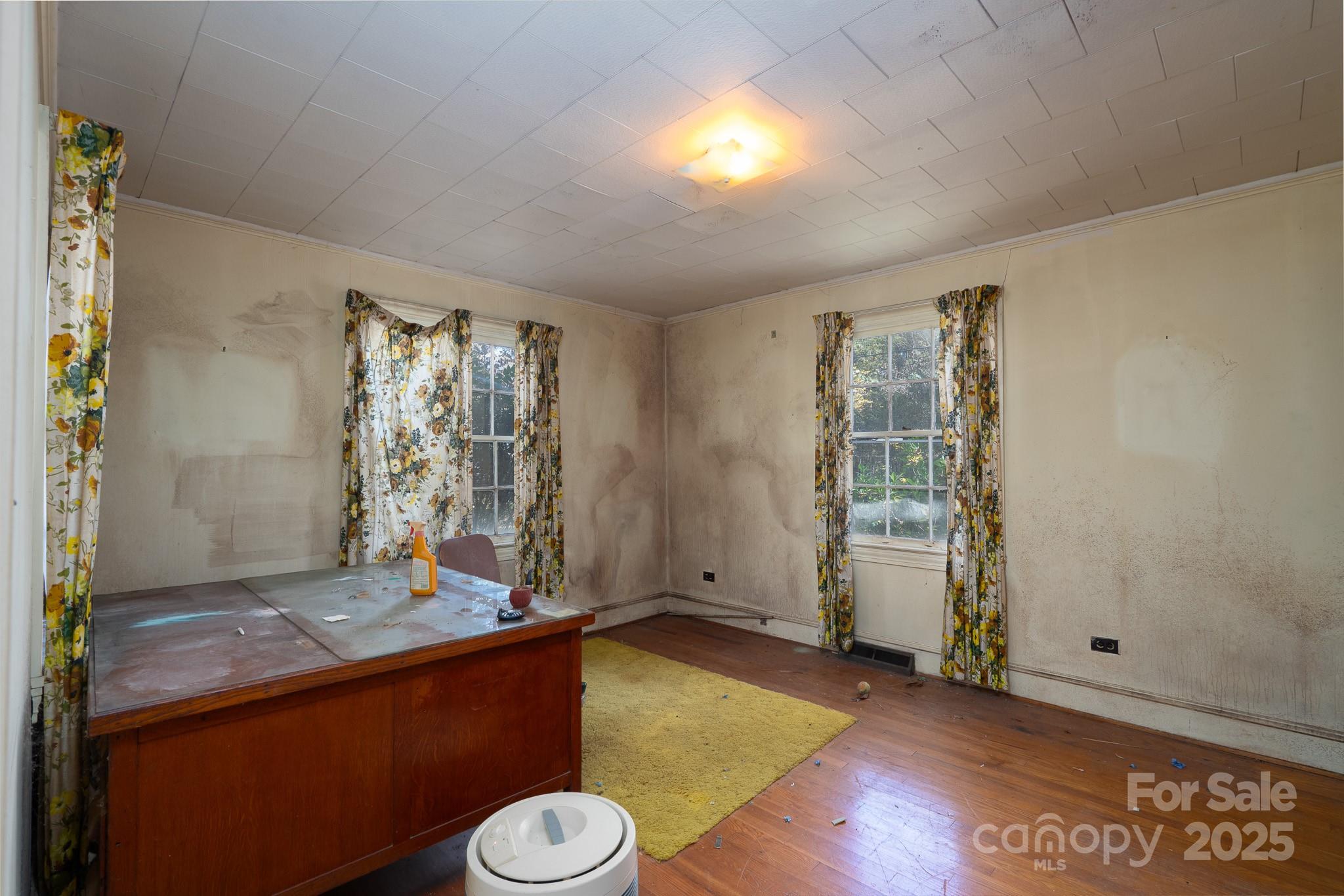 335 Richfield Road Richfield, NC 28137 - Photo 19 of 33 a view of room with window and wooden floor