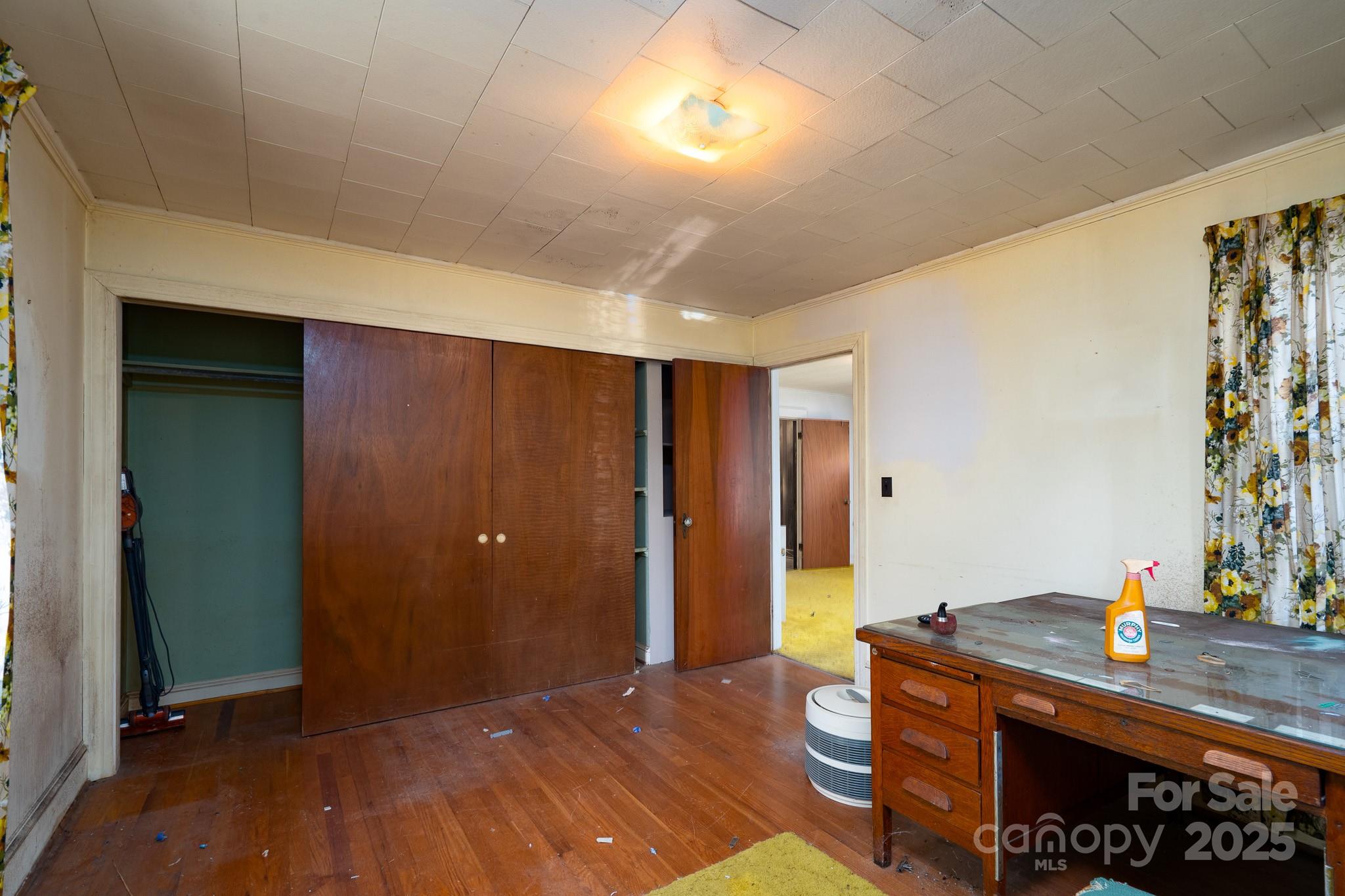 335 Richfield Road Richfield, NC 28137 - Photo 20 of 33 a view of room with furniture and wooden floor