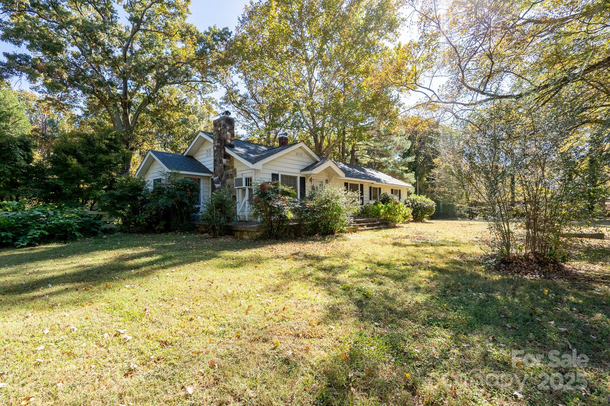 335 Richfield Road Richfield, NC 28137 - Photo 24 of 33 a front view of a house with a yard