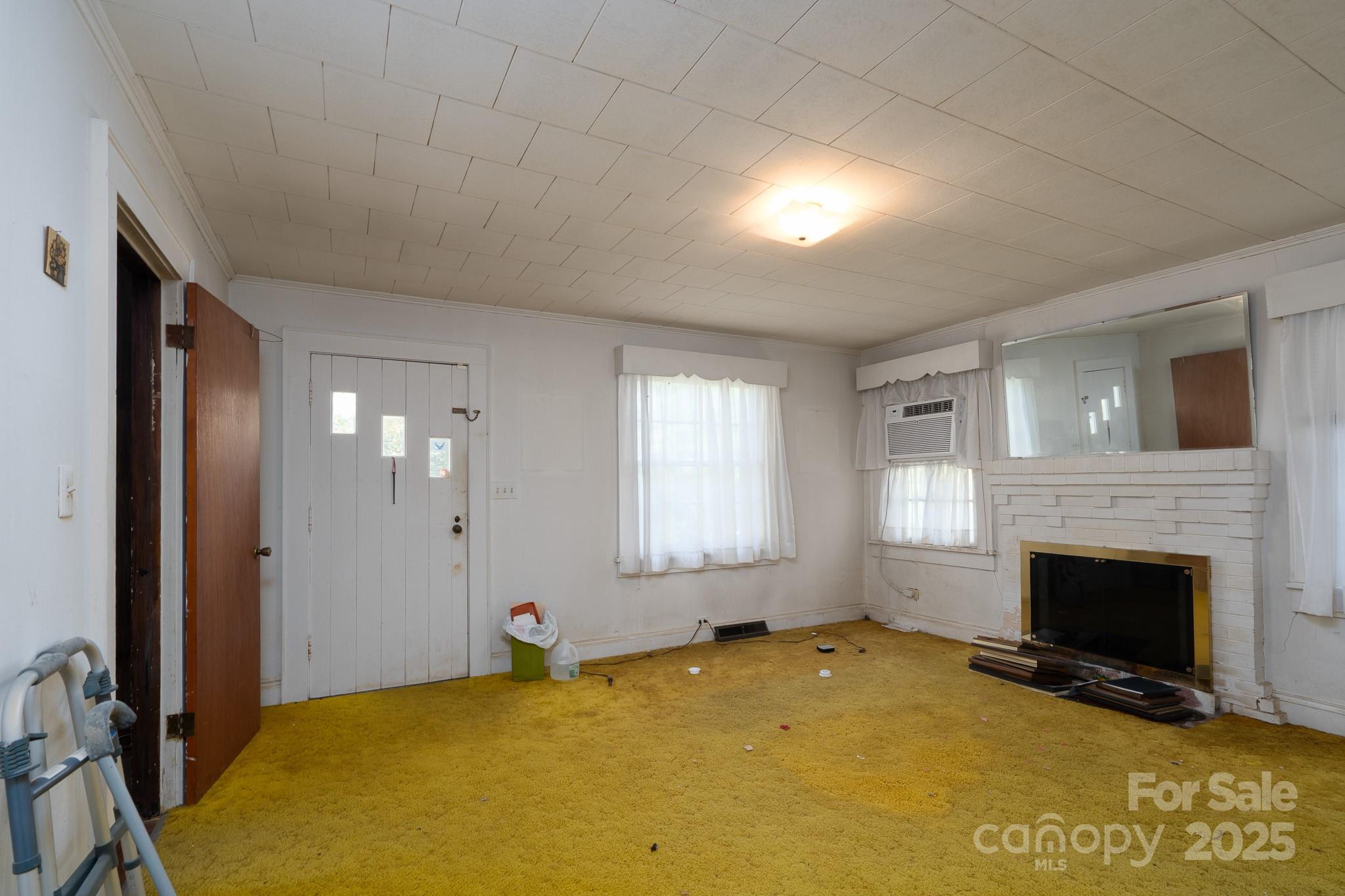 335 Richfield Road Richfield, NC 28137 - Photo 6 of 33 a view of empty room with windows