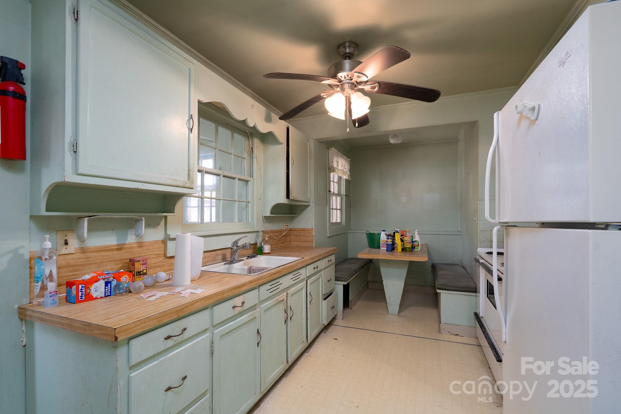 335 Richfield Road Richfield, NC 28137 - Photo 7 of 33 a kitchen with a sink cabinets and window