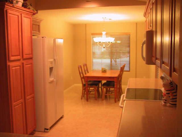 3606 West Vineyard Road Phoenix, AZ 85041 - Photo 2 of 7 a view of a dining room with furniture window and outside view