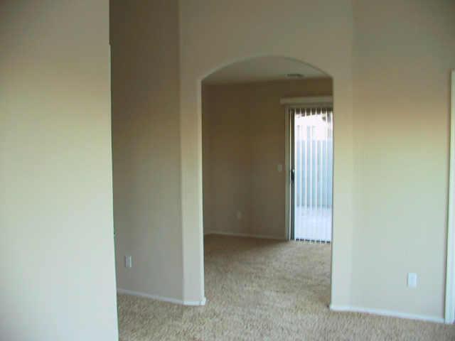 3606 West Vineyard Road Phoenix, AZ 85041 - Photo 3 of 7 a view of a room that has a large window