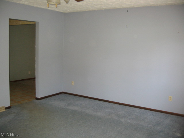 455 Broadview Road Tallmadge, OH 44278 - Photo 4 of 25 LIVING ROOM FROM ENTRY - DOORWAY LEADS TO EXPANSIVE KITCHEN/FAM RM AREA