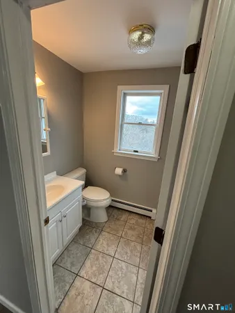 a view of a hallway with washer and dryer