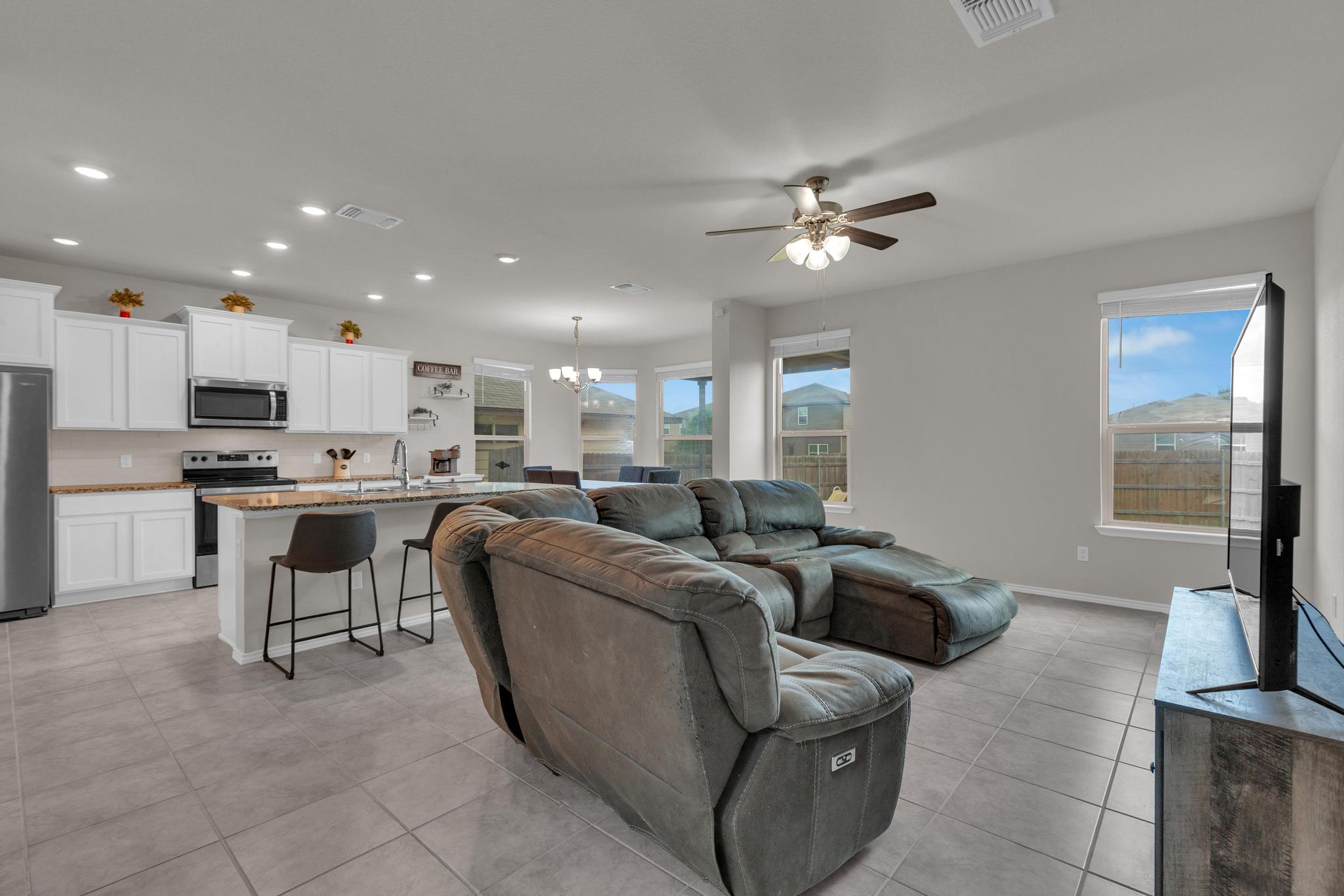 104 Uncle Billy Way Jarrell, TX 76537 - Photo 12 of 38 An open-concept living space with an eat-in kitchen, ideal for entertaining.