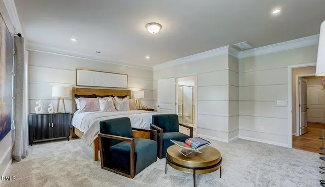 a bedroom with furniture and a fireplace