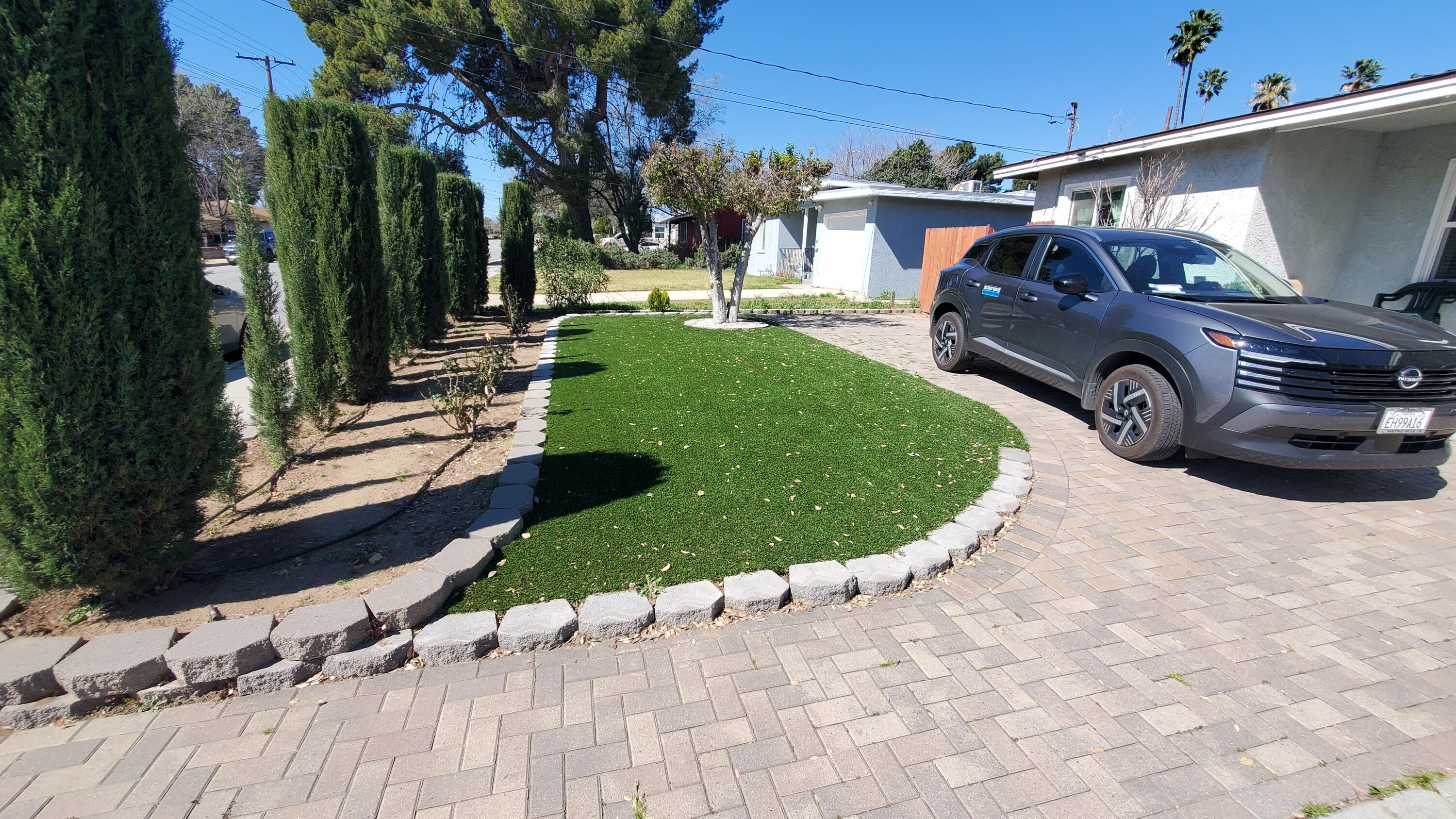 831 West George Street Banning, CA 92220 - Photo 2 of 39 a view of a backyard with table and chairs