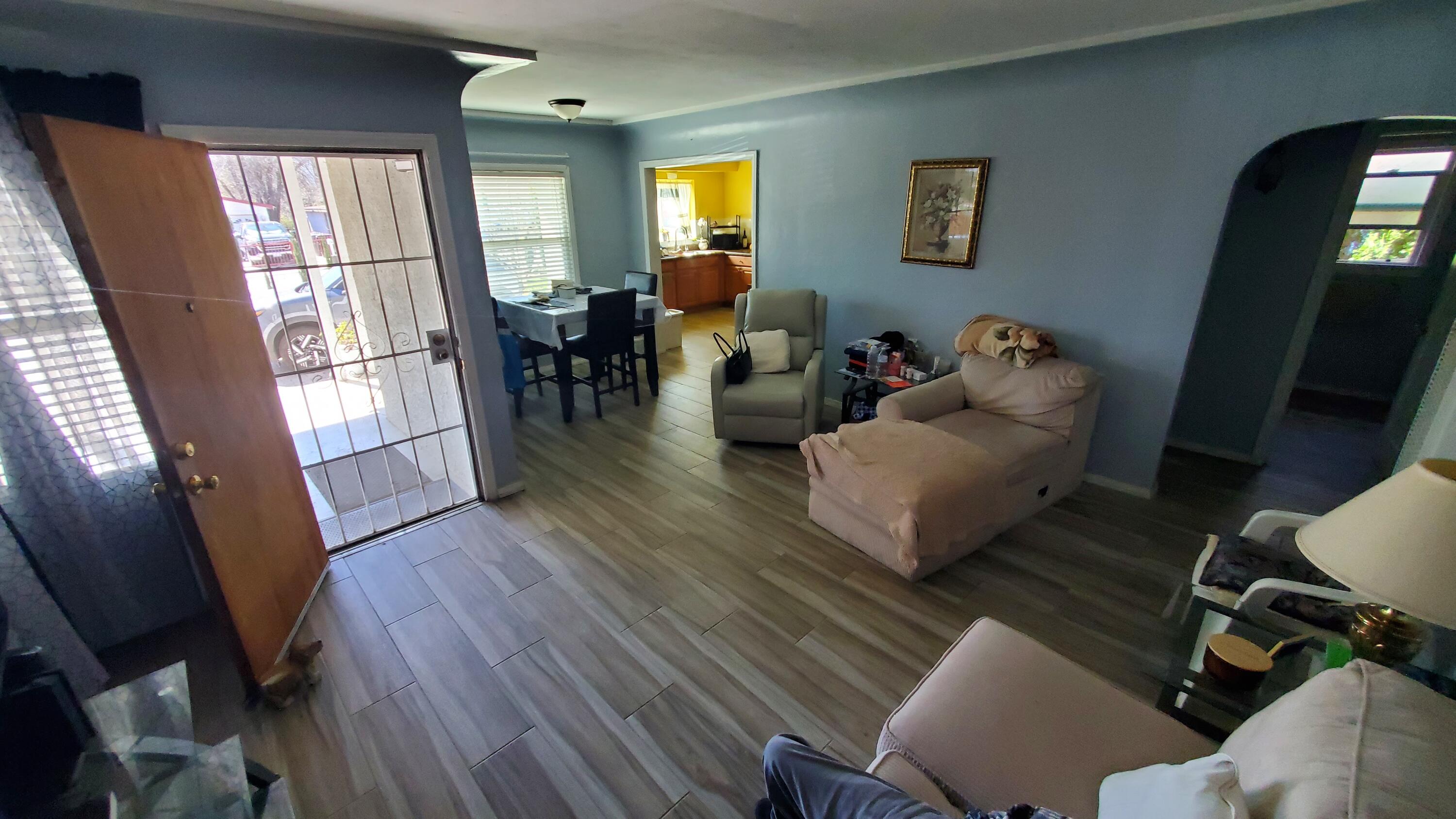 831 West George Street Banning, CA 92220 - Photo 21 of 39 a living room with furniture and wooden floor