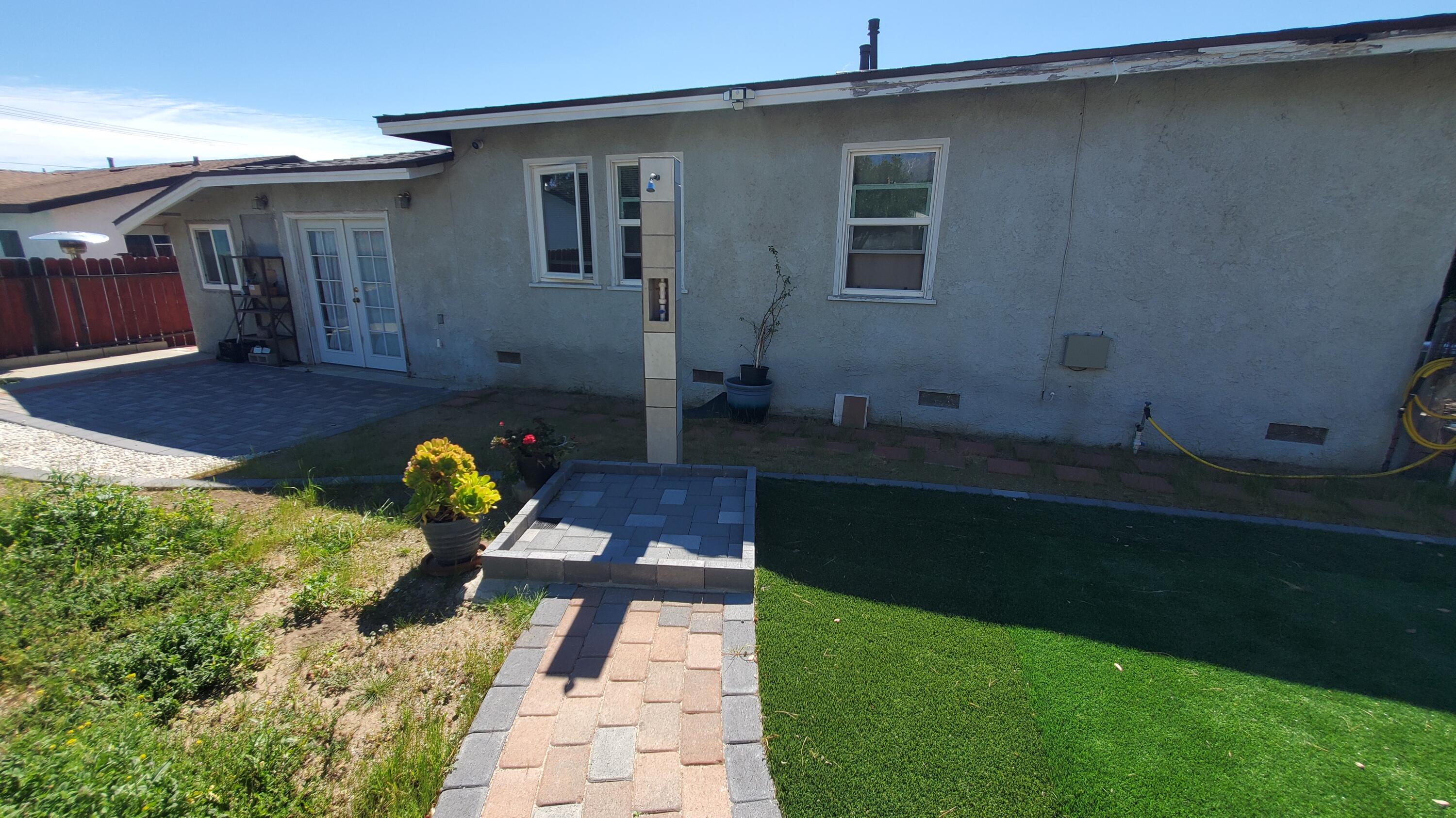 831 West George Street Banning, CA 92220 - Photo 29 of 39 a front view of a house with garden