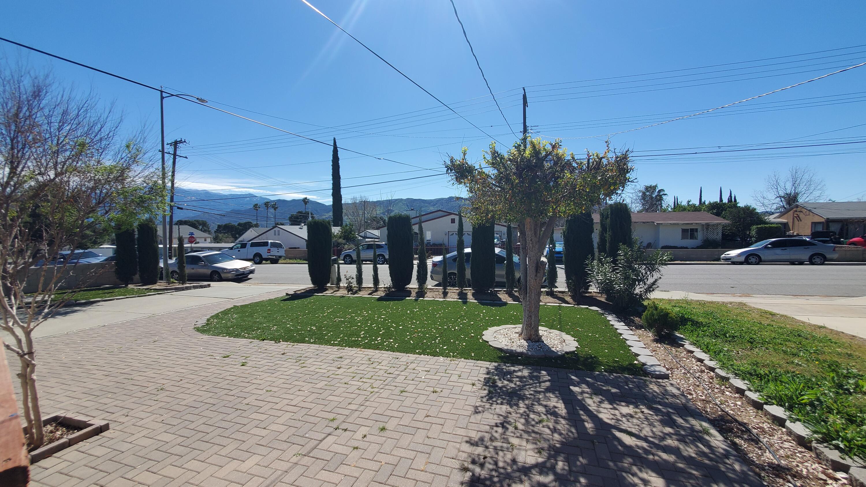 831 West George Street Banning, CA 92220 - Photo 36 of 39 a view of a house with backyard and porch