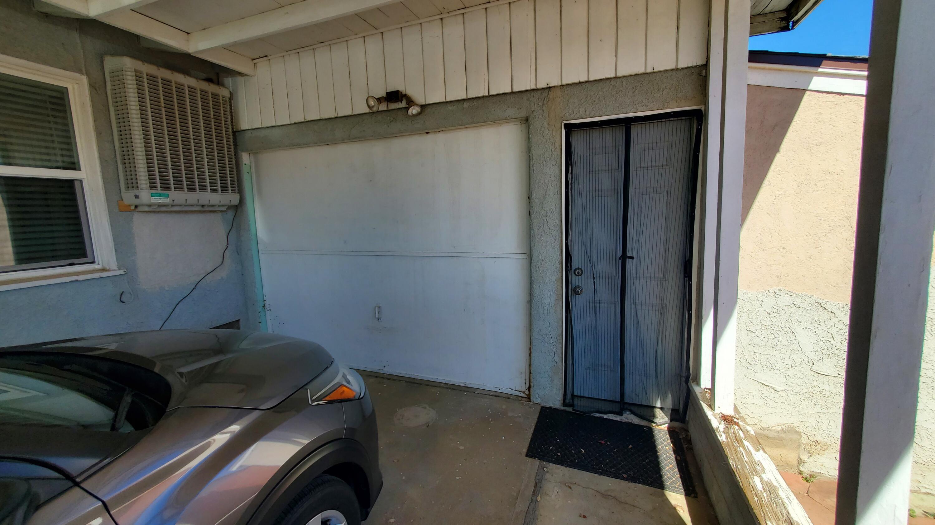 831 West George Street Banning, CA 92220 - Photo 5 of 39 a car parked in front of a house